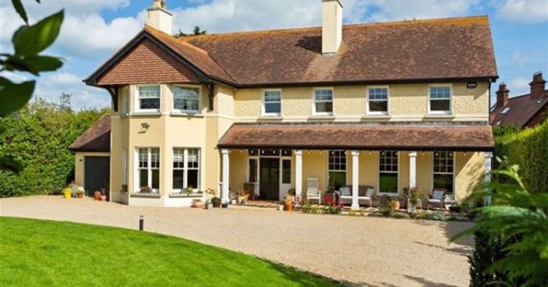 Saoirse Ronan Pine Lodge house exterior front facade with covered porch in Greystones Ireland