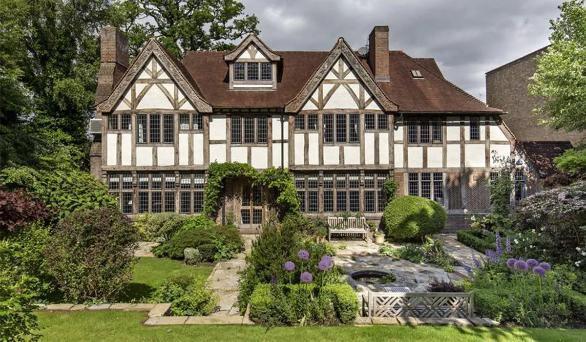Exterior facade of Liam Gallagher's 1920s mock Tudor house in Highgate North London featuring half-timbering and leaded windows